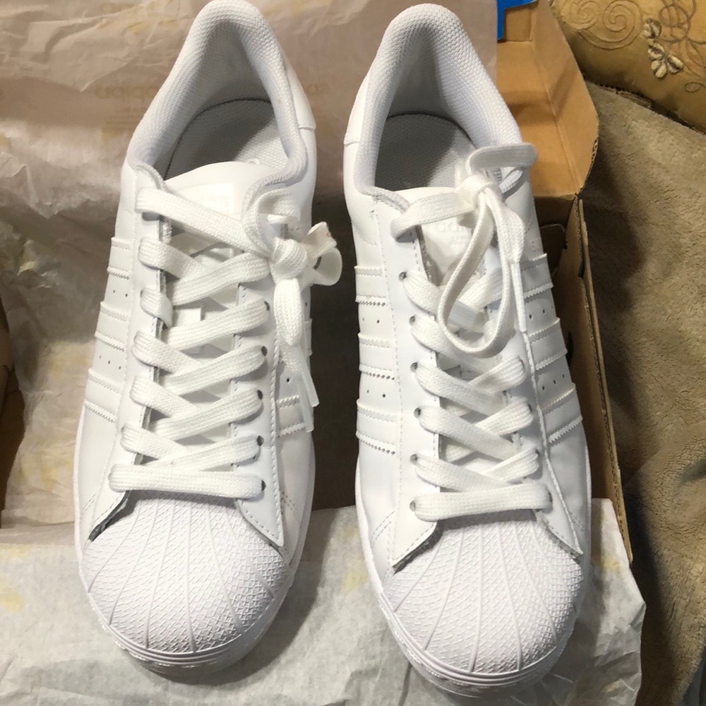 Women’s all white Adidas Superstar - never worn
